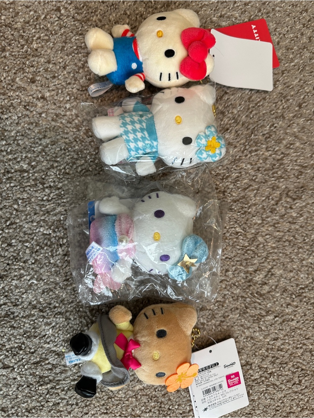 Sanrio Hello Kitty & Friends Plush Charm Set in White, Blue, Pink, Red, Brown